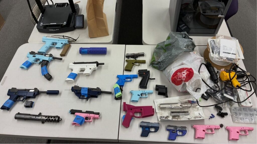 Police say a man carrying a loaded Tec-9-style firearm was arrested after a search warrant at a Visalia residence uncovered multiple firearms and evidence they were being manufactured on-site. (Visalia PD)