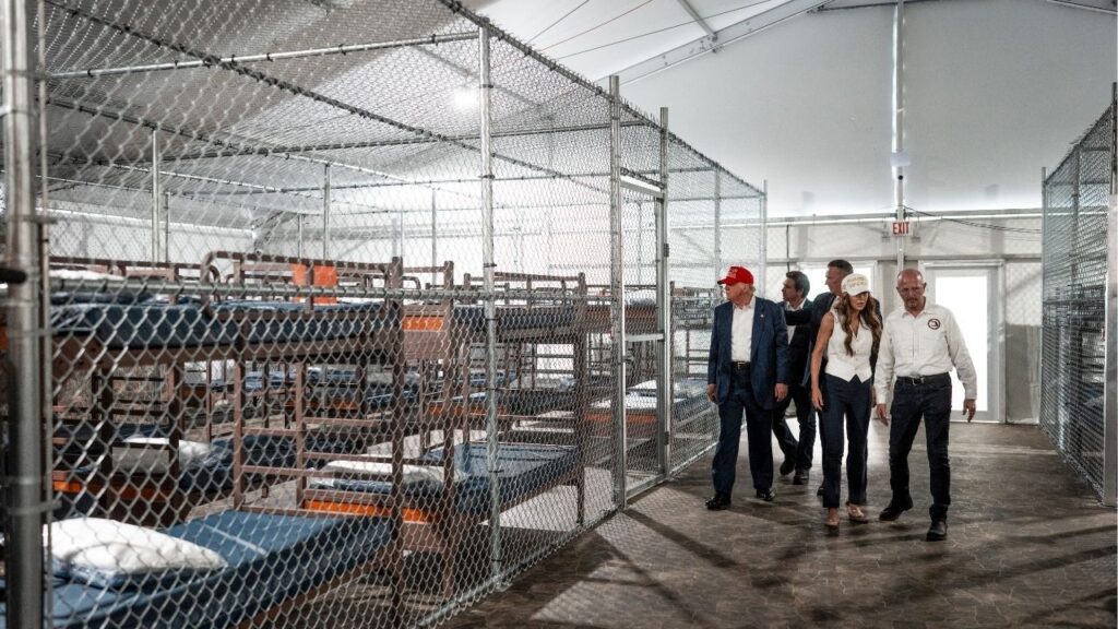 President Donald Trump and Kristi Noem, his Homeland Security secretary, tour the detention camp billed by the state of Florida as Alligator Alcatraz, at the Dade-Collier Training and Transition Airport in Ochopee, Fla., July 1, 2025. Florida is in talks with the Trump administration to shut down a high-profile immigration detention center, which DHS officials have concluded is too expensive to operate. (Doug Mills/The New York Times)