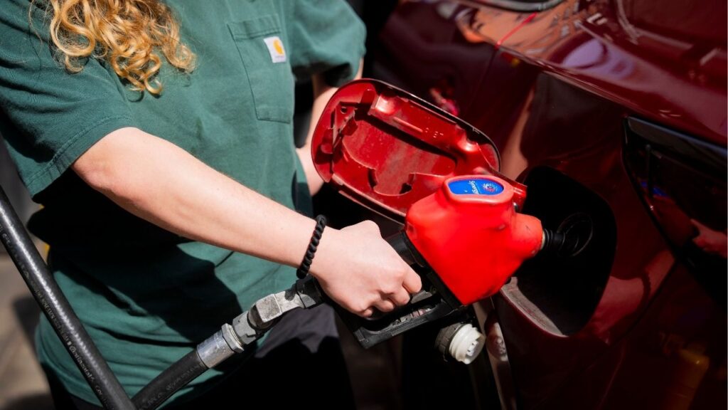 Pumping gas in New York, March 19, 2026. High fuel prices are weighing on sales of vehicles that run on gasoline or diesel. (Vincent Alban/The New York Times)
