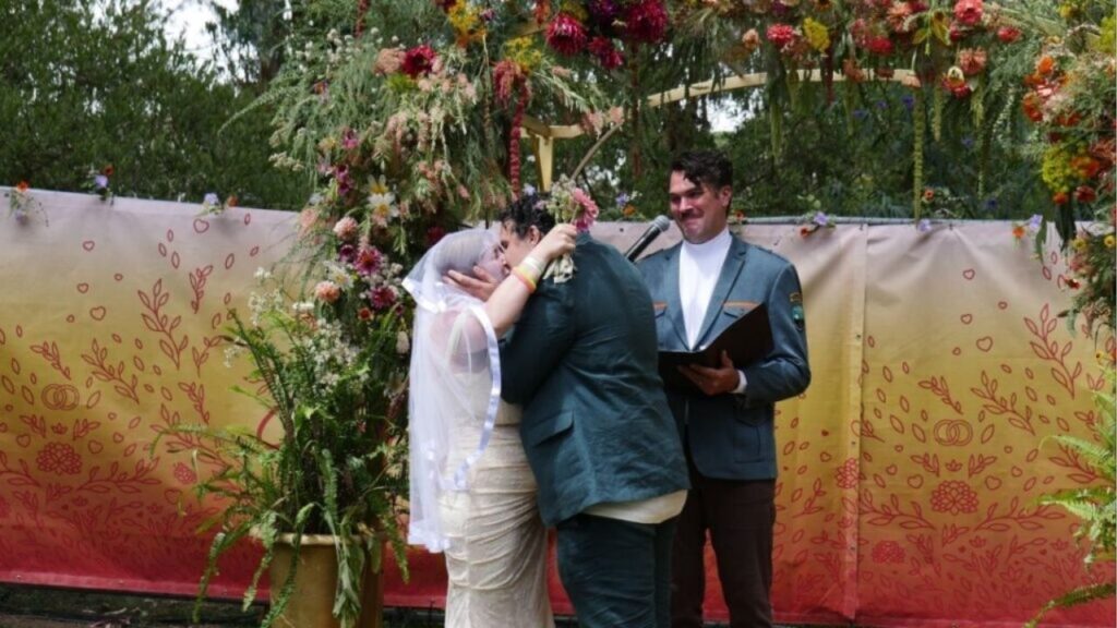 Sarah and Alexander Benko have their first kiss as a married couple at their marriage ceremony at Outside Lands on Friday, Aug. 8, 2025. (GV Wire)