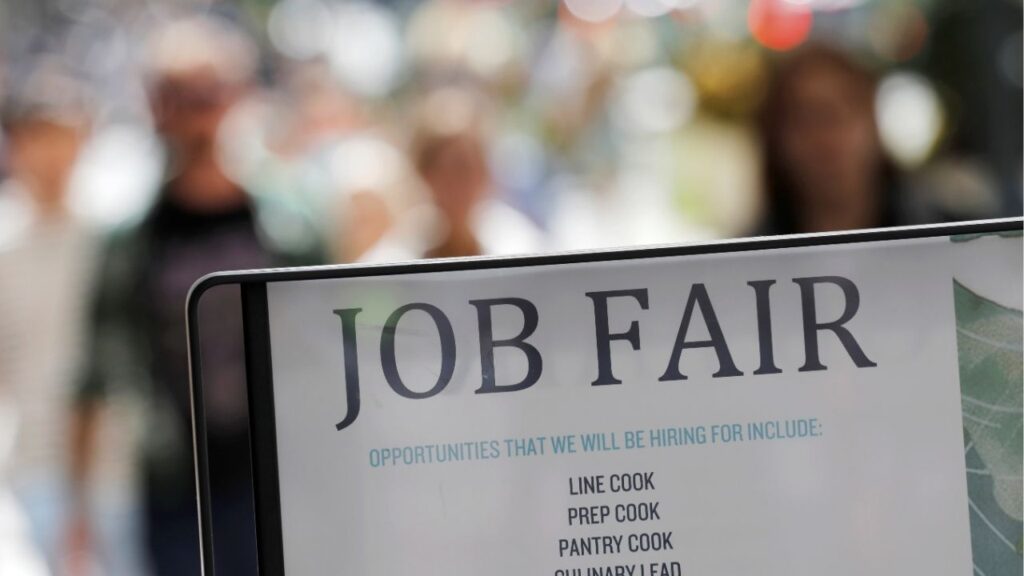 Signage for a job fair is seen on 5th Avenue after the release of the jobs report in Manhattan, New York City, U.S., September 3, 2021. (Reuters/Andrew Kelly)
