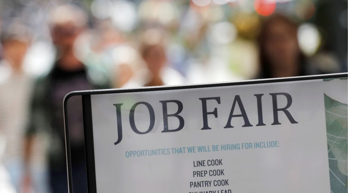 Signage for a job fair is seen on 5th Avenue after the release of the jobs report in Manhattan, New York City, U.S., September 3, 2021. (Reuters/Andrew Kelly)