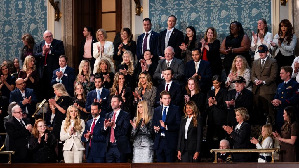 Image of Trump family members and others cheering President Trump's 2026 State of the Union address