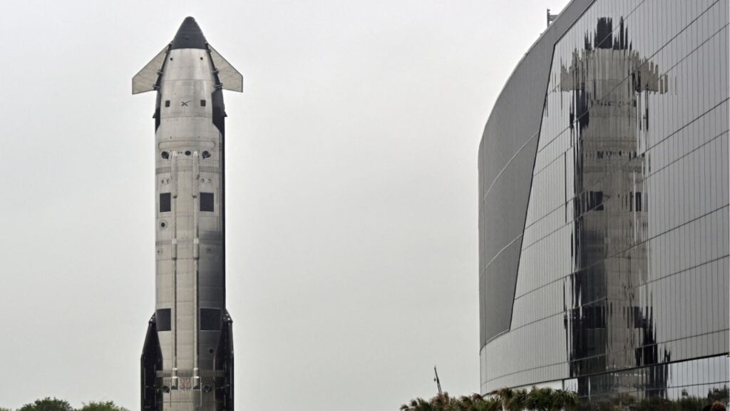 The SpaceX Starship spacecraft rolls past the production facility toward launch pad 2 ahead of its 12th test flight, in Starbase, Texas, U.S., May 19, 2026. (Reuters/Steve Nesius)