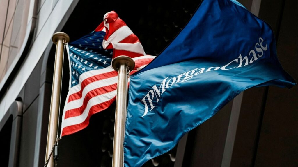 The U.S. flag and a flag with the logo of JPMorgan Chase & Co., flutters at the firm's headquarters in New York City, U.S., April 1, 2026. (Reuters File)