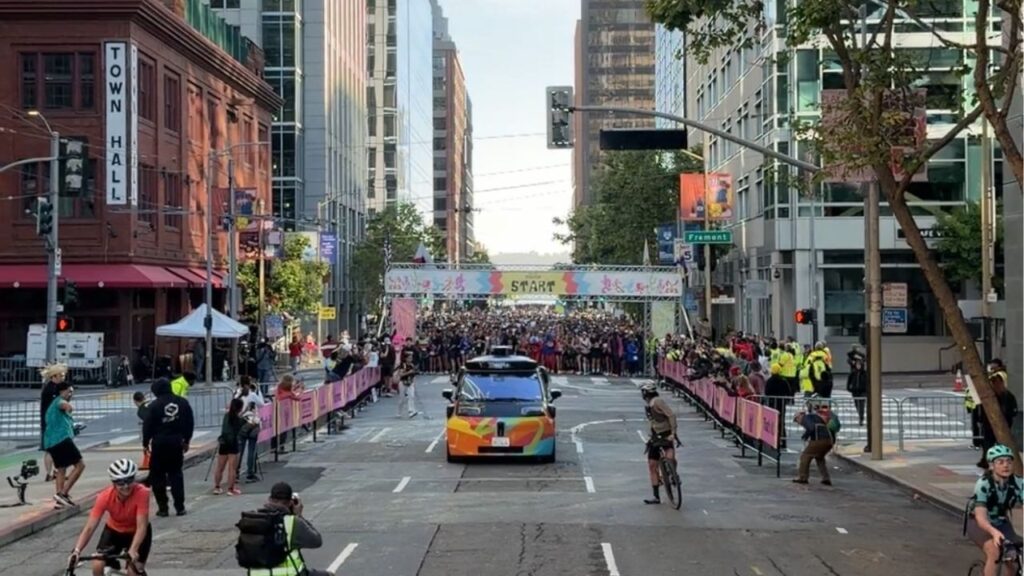 The view of the race and the Waymo care in front of the starting line at Bay to Breakers on May 17, 2026. (Anthony W. Haddad)