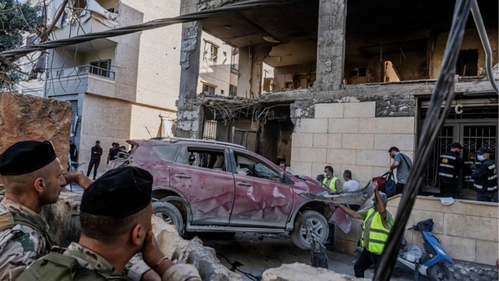 Workers retrieve a destroyed vehicle at the site of an apartment building that was hit in an Israeli airstrike in the neighborhood of Choueifat in southern Beirut, on Thursday, May 28, 2026. Israel widened its offensive in Lebanon on Thursday, striking Beirut for the first time in almost a month and pushing deeper into the country’s south, as its escalating conflict with Hezbollah threatens negotiations to end the U.S.-Israeli war in Iran. (Daniel Berehulak/The New York Times)