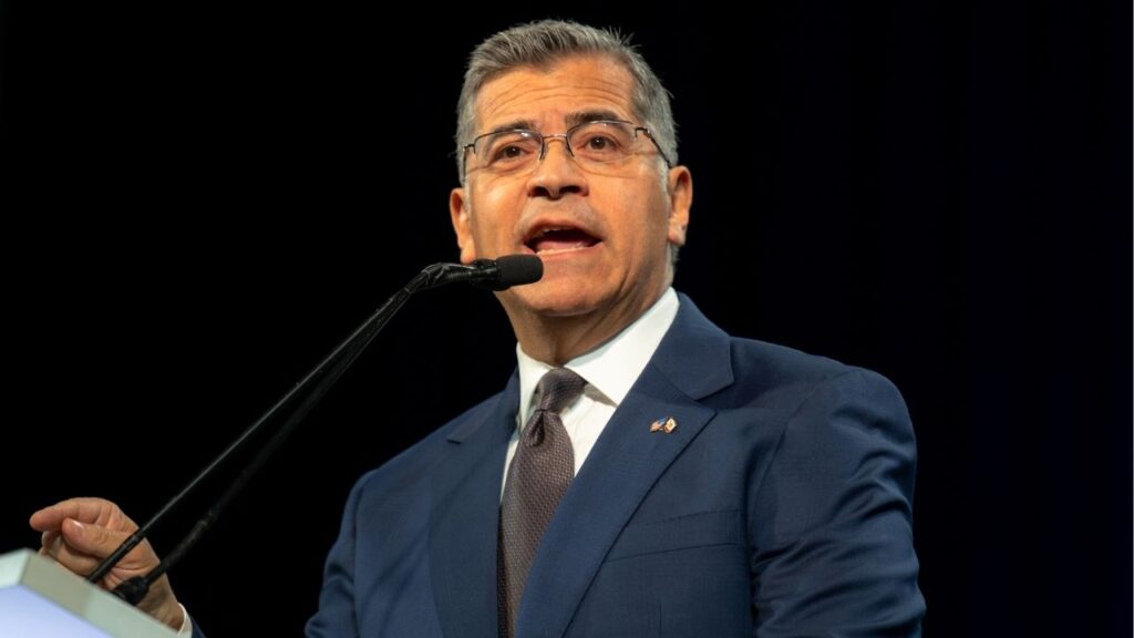 Xavier Becerra, the former secretary of Health and Human Services, speaks during the state Democratic Convention in San Francisco, Feb 21, 2026. Opponents of Becerra, the Democratic front-runner for governor, have been excoriating his tenure as secretary of Health and Human Services. (Mike Kai Chen/The New York Times)