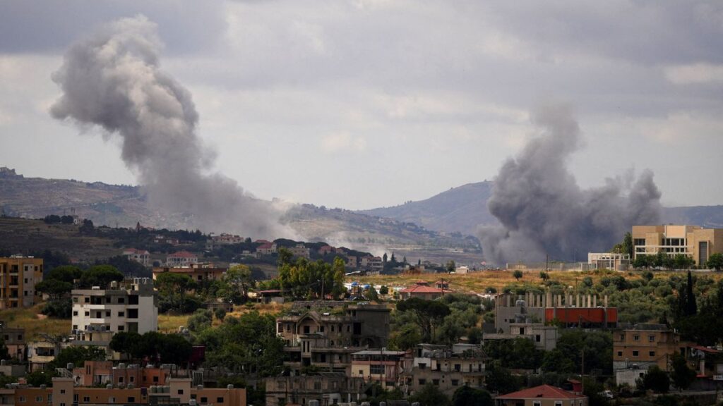 Image of smoke rising on the hillside in southern Lebanon after an Israeli strike