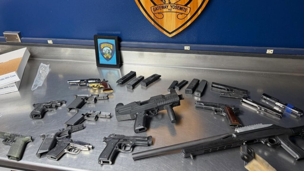 A Merced man was arrested after detectives investigating an Internet Crimes Against Children tip served a search warrant on a 9th Street residence and seized electronic devices, 11 firearms, and a grenade. (Merced PD)