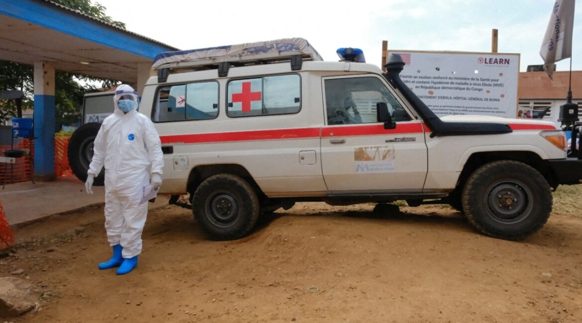 A doctor wearing personal protective equipment (PPE) stands near an ambulance at the Ebola Virus Disease Treatment Center at the Bunia General Reference Hospital, one month after cases were confirmed in Bunia, eastern Democratic Republic of Congo, June 15, 2026. (Reuters File)