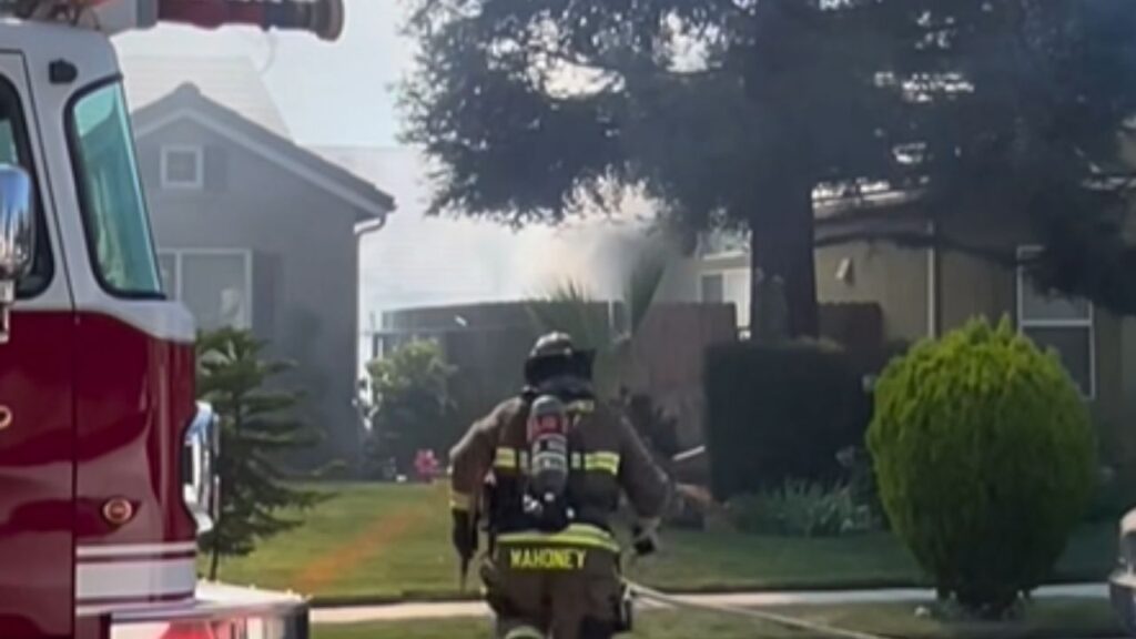 A fence fire in Fresno briefly spread to a home’s exterior and threatened a second residence Wednesday before firefighters contained the blaze with no injuries reported. (Fresno FD)