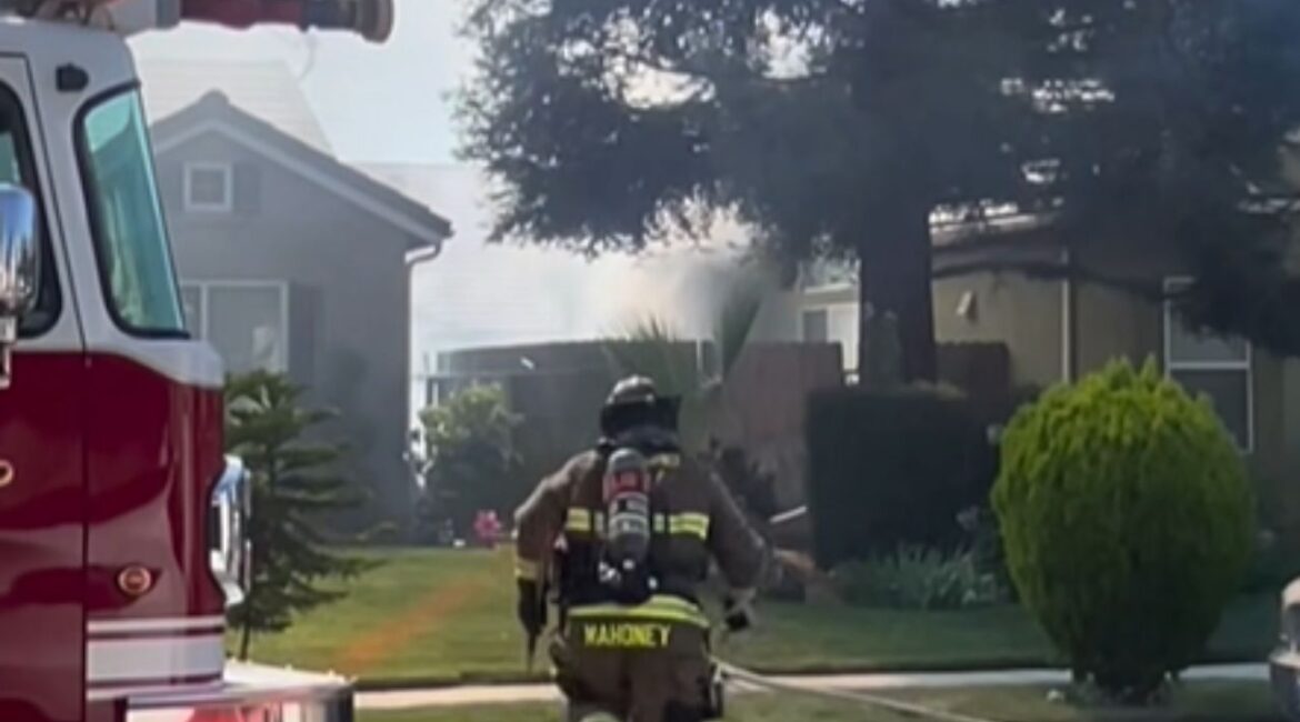 A fence fire in Fresno briefly spread to a home’s exterior and threatened a second residence Wednesday before firefighters contained the blaze with no injuries reported. (Fresno FD)