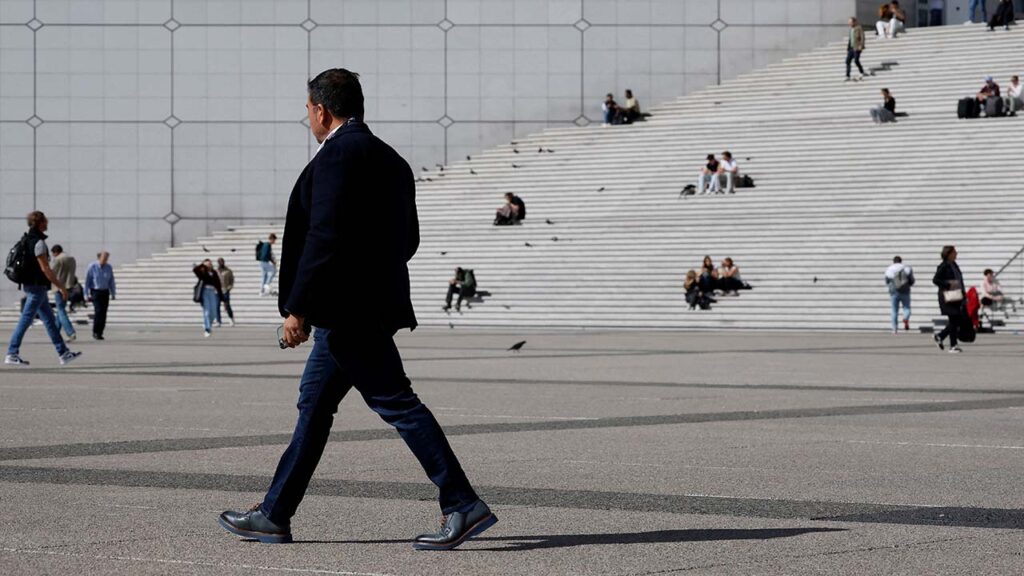 A man walks past the steps near the Grande Arche at the financial and business district of La Defense in Puteaux near Paris, france, September 12, 2025. (Reuters/Stephanie Lecocq)