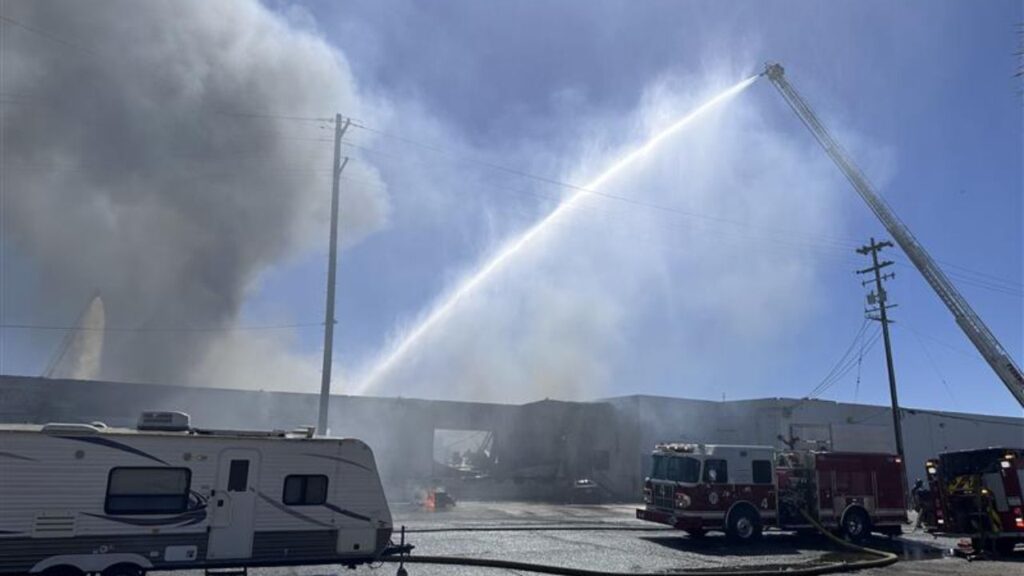 A photo of water being sprayed at a warehouse in Downtown Fresno on Thursday, June 4, 2026. (Edward Smith)