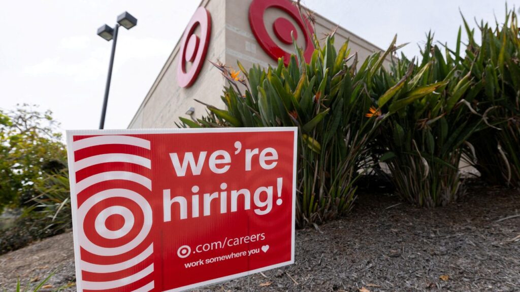 A sign posted outside a Target store states the company is hiring in Encinitas, California, U.S., March 30, 2026. (Reuters File)