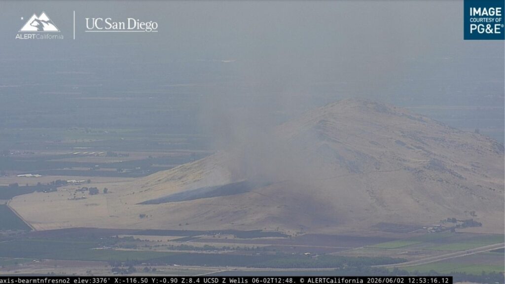 A vegetation fire in Fresno County grew to 25 to 30 acres while burning uphill through dry vegetation, prompting a helicopter and air tanker response before crews reported good progress and reduced fire activity. (Alert California)