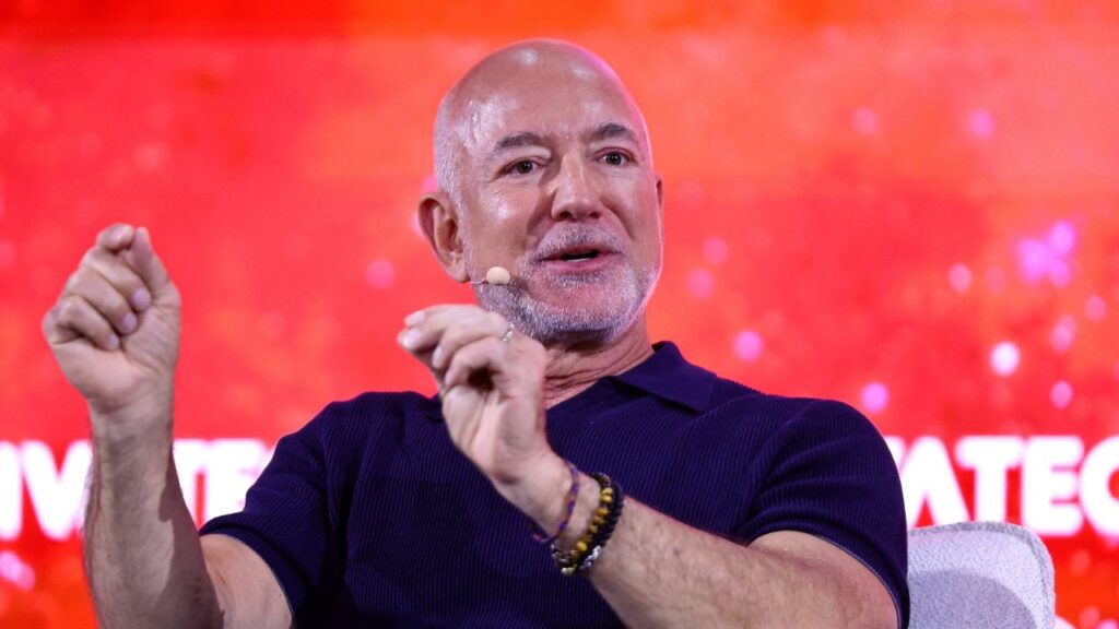 Jeff Bezos, founder of Amazon and Blue Origin, and co-founder and co-CEO of Prometheus, gestures as he speaks during the 10th edition of the VivaTech technology startups and innovation fair in Paris, France, June 17, 2026. (REUTERS/Abdul Saboor)