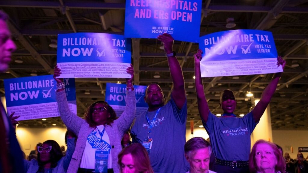 Advocates for a billionaire tax at the California Democratic Convention in San Francisco, Feb. 21, 2026. The proposal to tax the wealth of billionaires in California has officially gathered enough signatures to appear on the November ballot, state officials announced on June 17. (Mike Kai Chen/The New York Times)