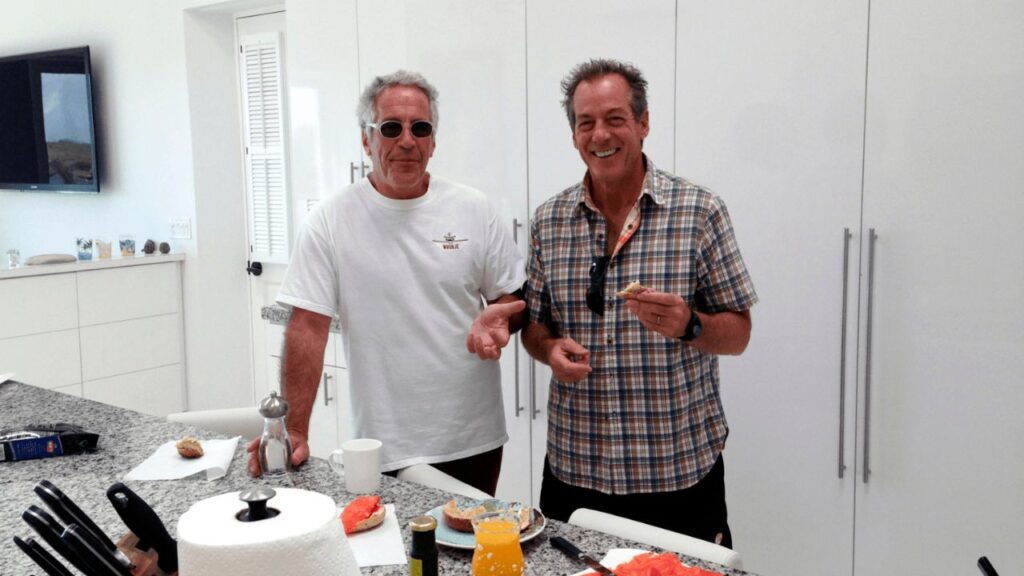 An undated image provided by the U.S. Department of Justice showing Jeffrey Epstein, left, and New York restaurant mogul Steve Hanson in a kitchen on Little Saint James, Epstein’s private island in the Caribbean. Hanson was a devoted friend and wingman who helped manage and entertain women in the orbit of the convicted sex offender. (U.S. Department of Justice via The New York Times)