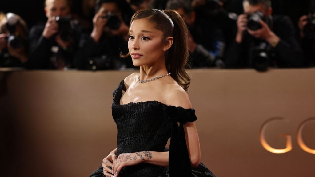 Ariana Grande poses on the red carpet at the 83rd Annual Golden Globes in Beverly Hills, California, U.S., January 11, 2026. REUTERS/Daniel Cole