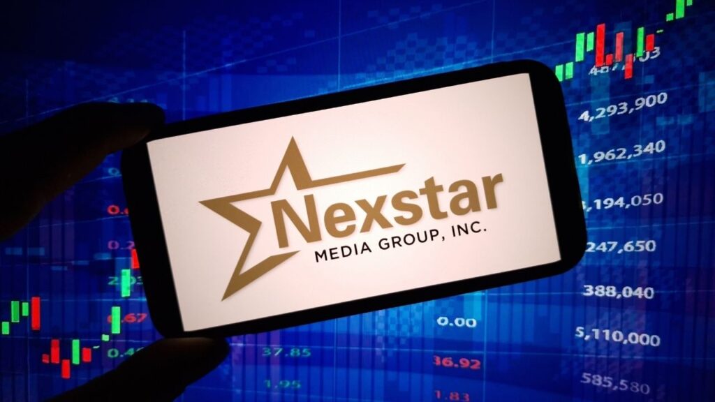 Asset id: 2436755687 Konskie, Poland - March 11, 2024: Nexstar Media Group company logo displayed on mobile phone