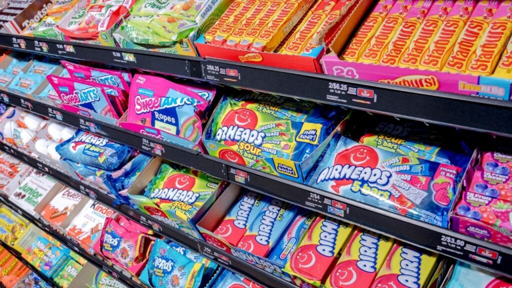 Candy and snacks for sale at a convenience store in Romulus, Mich., Feb. 4, 2025. A federal judge on Monday, June 22, 2026, blocked the Trump administration from barring the use of food stamps to buy sugary drinks and candy. (Nic Antaya/The New York Times)