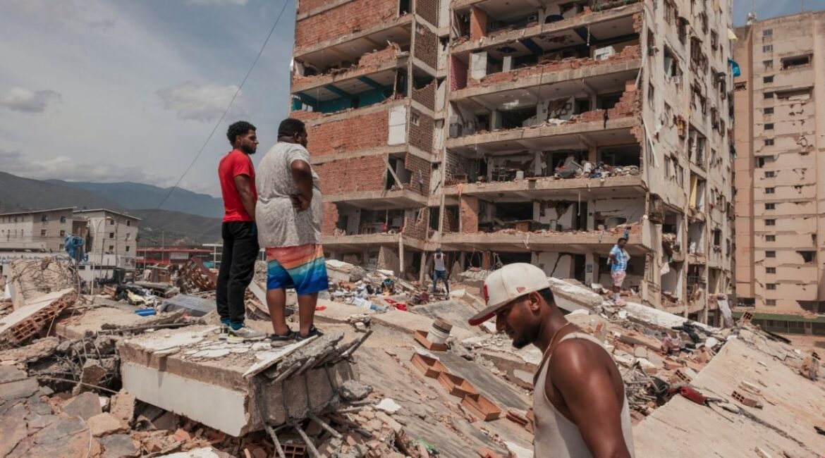 Civilians look for survivors in the rubble of a residential building after Wednesday’s earthquakes in Catia La Mar, Venezuela, on Thursday, June 26, 2026. Rescue crews intensified their search for survivors on Thursday as Venezuelans began to grapple with the scale of the devastation caused by the worst earthquakes to hit the country in nearly six decades. (Adriana Loureiro Fernandez/The New York Times)