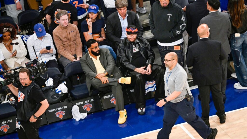 DJ Khaled, center left, sits with Fat Joe courtside during Game 3 of the NBA Finals between the San Antonio Spurs and the New York Knicks at Madison Square Garden in New York, on Monday, June 8, 2026. (Vincent Alban/The New York Times)