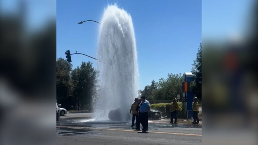 Emergency crews are responding after a car struck a fire hydrant at Mineral King Avenue and Conyer Street on Tuesday, causing significant water release, with Cal Water notified and officials urging the public to avoid the area while crews work. (Visalia PD)