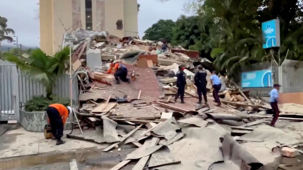 Emergency services work at the site of a collapsed building after a strong earthquake shook north-central Venezuela on Wednesday afternoon, in Caracas, Venezuela, June 24, 2026, in this screengrab from video. REUTERS TV/via REUTERS