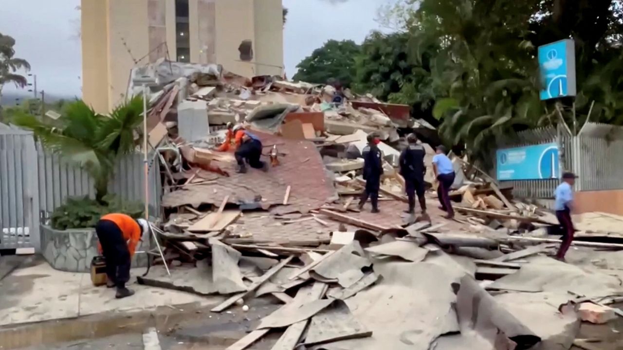 Emergency services work at the site of a collapsed building after a strong earthquake shook north-central Venezuela on Wednesday afternoon, in Caracas, Venezuela, June 24, 2026, in this screengrab from video. REUTERS TV/via REUTERS
