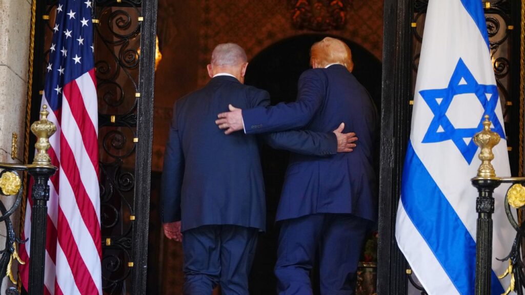 FILE — President Donald Trump welcomes Prime Minister Benjamin Netanyahu of Israel to his Mar-a-Lago resort in Palm Beach, Fla., Dec. 29, 2025. Recent U.S. intelligence reports have raised concerns about Israeli spy agencies eavesdropping on American negotiators working on a peace deal with Iran, amid rising concern over a more general counterintelligence threat by Israel. (Tierney L. Cross/The New York Times)