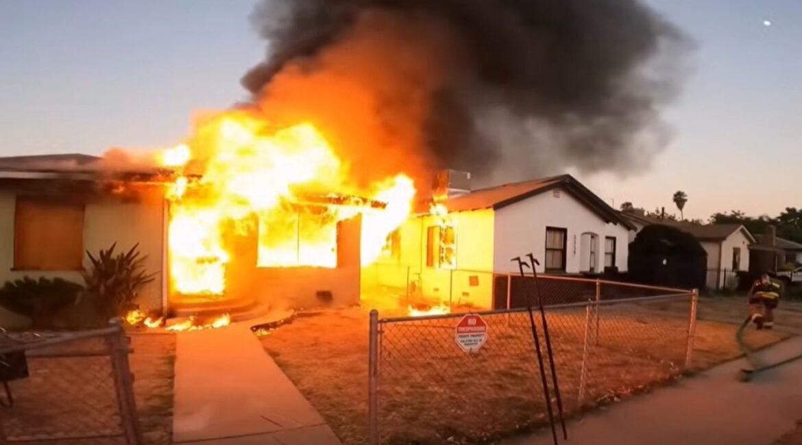 Fresno firefighters say an arson fire destroyed a vacant home under construction on S. Lily Ave. late Wednesday night, damaging a nearby residence and displacing two people. (Fresno FD)