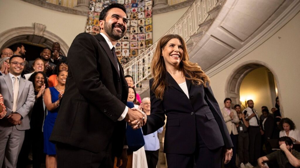 From left, Mayor Zohran Mamdani and City Council Speaker Julie Menin shake hands during a press conference to announce an agreement on the first budget of their respective tenures, at City Hall in New York on Tuesday, June 30, 2026. Mamdani and Menin held days of late-stage negotiations that were often rancorous before reaching agreement. (Dave Sanders/The New York Times)