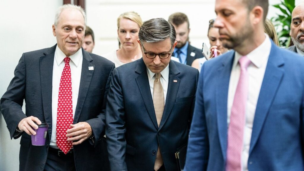 House Speaker Mike Johnson (R-La.), center, and House Majority Leader Steve Scalise (R-La.), left, before the weekly Republican caucus meeting at the Capitol in Washington, on Tuesday, June 30, 2026. Ultraconservative lawmakers refused to back a critical procedural measure on Tuesday as they pressed for action on a voting restriction bill championed by President Donald Trump. (Eric Lee/The New York Times)