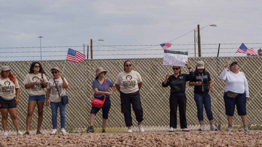 Protesters opposing mass deportations by ICE hold signs during a protest held at the Cassidy Gate at Fort Bliss, the U.S. Army base where a large new ICE detention facility is being built, in El Paso, Texas, U.S., August 17, 2025. (Reuters/File Photo)