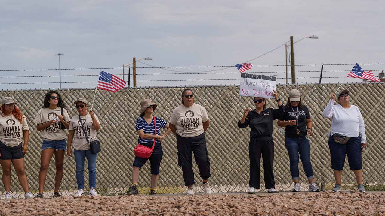 Protesters opposing mass deportations by ICE hold signs during a protest held at the Cassidy Gate at Fort Bliss, the U.S. Army base where a large new ICE detention facility is being built, in El Paso, Texas, U.S., August 17, 2025. (Reuters/File Photo)