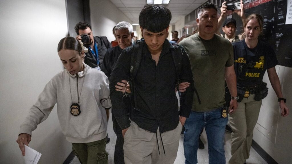 Immigration and Customs Enforcement agents detain an immigrant from Guatemala outside a court hearing in lower Manhattan on July 22, 2025. A federal judge in California issued an order on Tuesday, June 23, 2026, blocking immigration agents nationwide from making arrests inside immigration courts. The decision halts what had been one of the most aggressive aspects of President Trump’s mass deportation campaign. (Victor J. Blue/The New York Times)