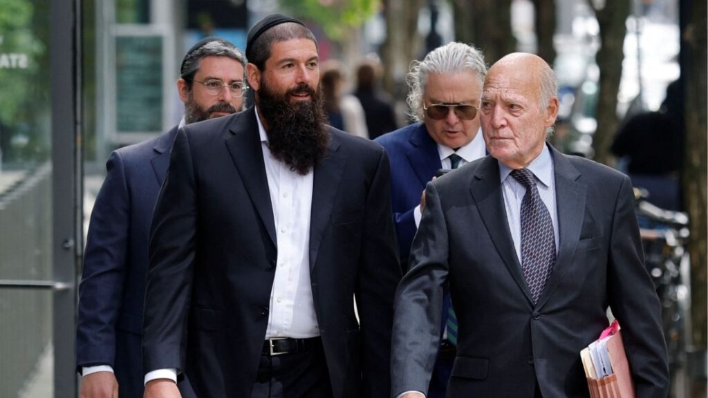 Lorenzo Nourafchan and Nicolo Nourafchan arrive to the federal courthouse, where they are facing charges with participating in an insider trading scheme in which attorneys at major law firms passed tips on merger deals to a network of individuals who traded on the information, in Boston, Massachusetts, U.S., June 1, 2026. (Reuters/CJ Gunther)
