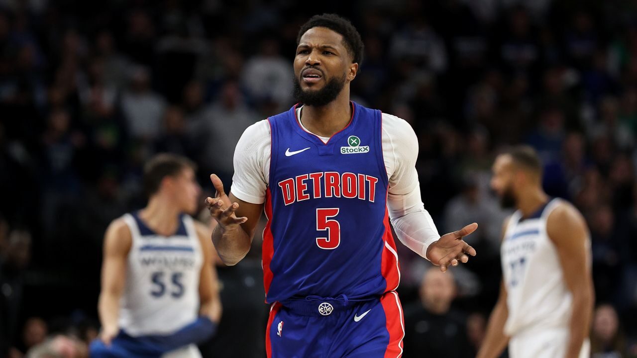 Image of Malik Beasley in a Detroit Pistons uniform running up the court