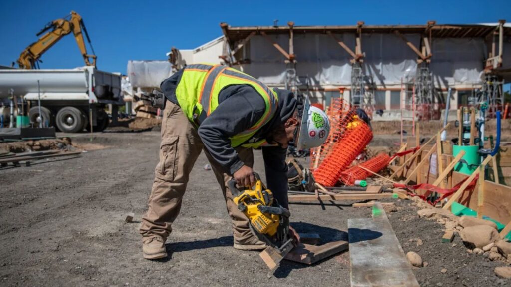 Martin Rivera works at the Quito Village Development Project in Saratoga on April 13, 2023. Photo by Martin do Nascimento, CalMatters