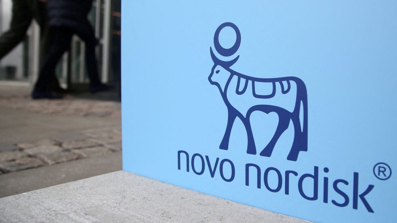 People walk past a sign for Novo Nordisk’s annual general meeting at the entrance to the venue in Copenhagen, Denmark, March 26, 2026. (Reuters File)