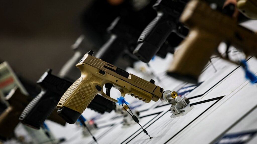 Pistols are displayed during the National Rifle Association annual meeting in Atlanta, Georgia, U.S. April 25, 2025. (Reuters/Jeenah Moon)