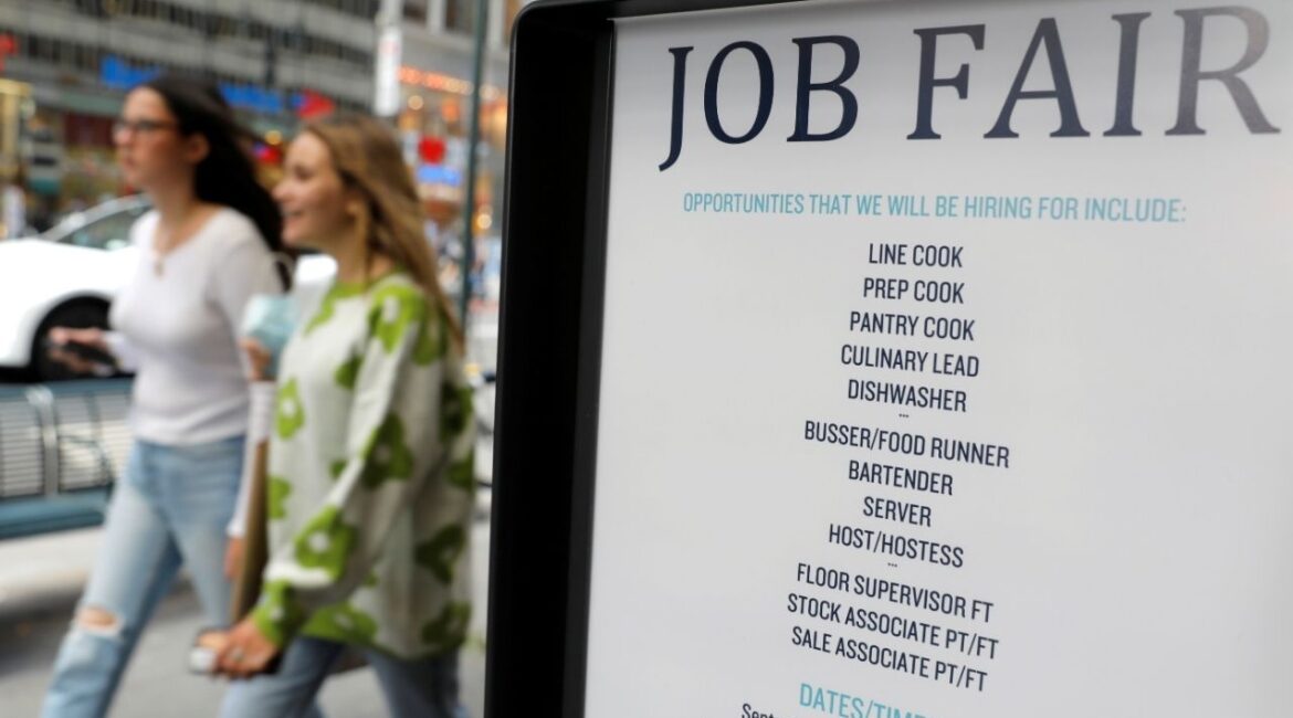 Signage for a job fair is seen on 5th Avenue after the release of the jobs report in Manhattan, New York City, U.S., September 3, 2021. (Reuters/Andrew Kelly)