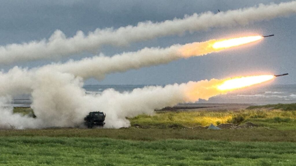 Taiwan's High Mobility Artillery Rocket Systems (HIMARS) fire rockets during a live-fire military exercise, which simulates an enemy invasion, in Taichung, Taiwan June 10, 2026. Picture taken with a mobile phone. REUTERS/Angie Teo