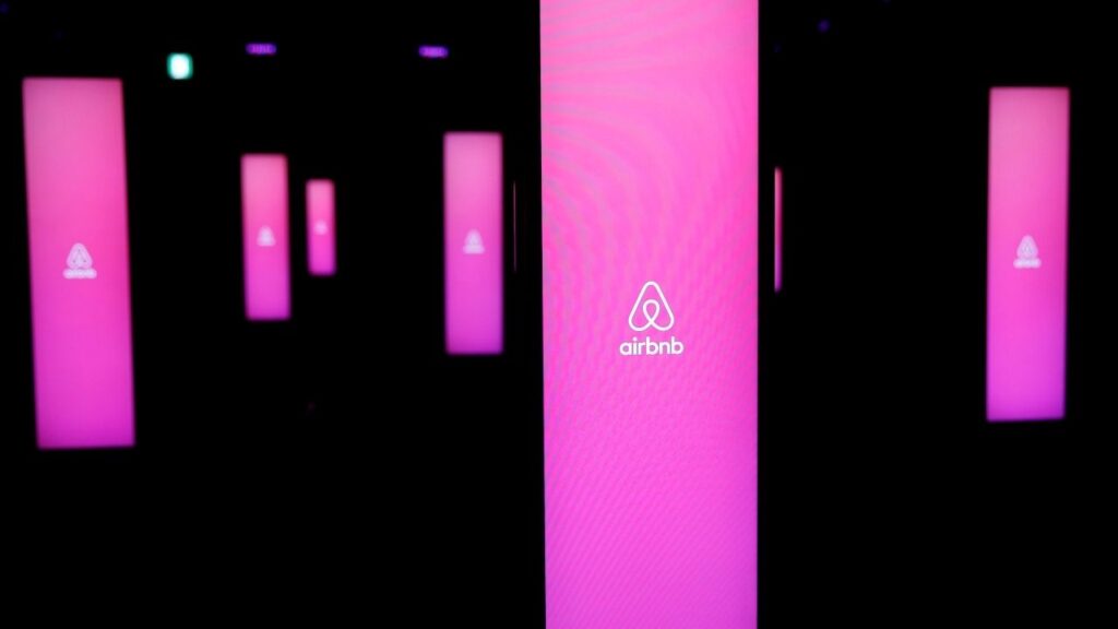 The logos of Airbnb are displayed at an Airbnb event in Tokyo, Japan, June 14, 2018. REUTERS/Issei Kato