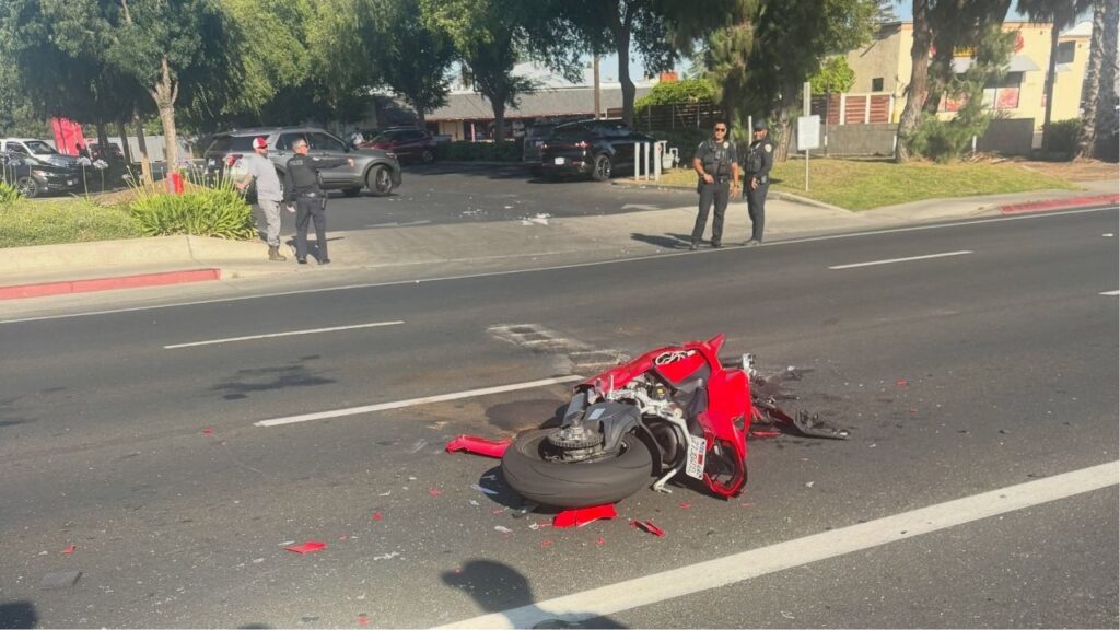 Two people were injured and taken to a hospital after a motorcycle crash Monday evening at Mooney Boulevard and Beech Avenue in Visalia. (Visalia PD)