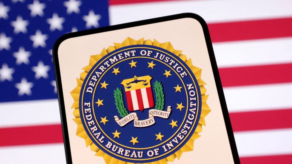 United States Department of Justice logo and U.S. flag are seen in this illustration taken April 23, 2025. (Reuters/Dado Ruvic/Illustration)