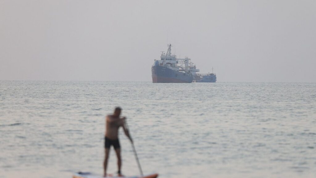 Vessels in the Strait of Hormuz near the beach of Bandar Abbas, Iran, June 21, 2026. (Amirhosein Khorgooi/ISNA/via WANA (West Asia News Agency)via Reuters)